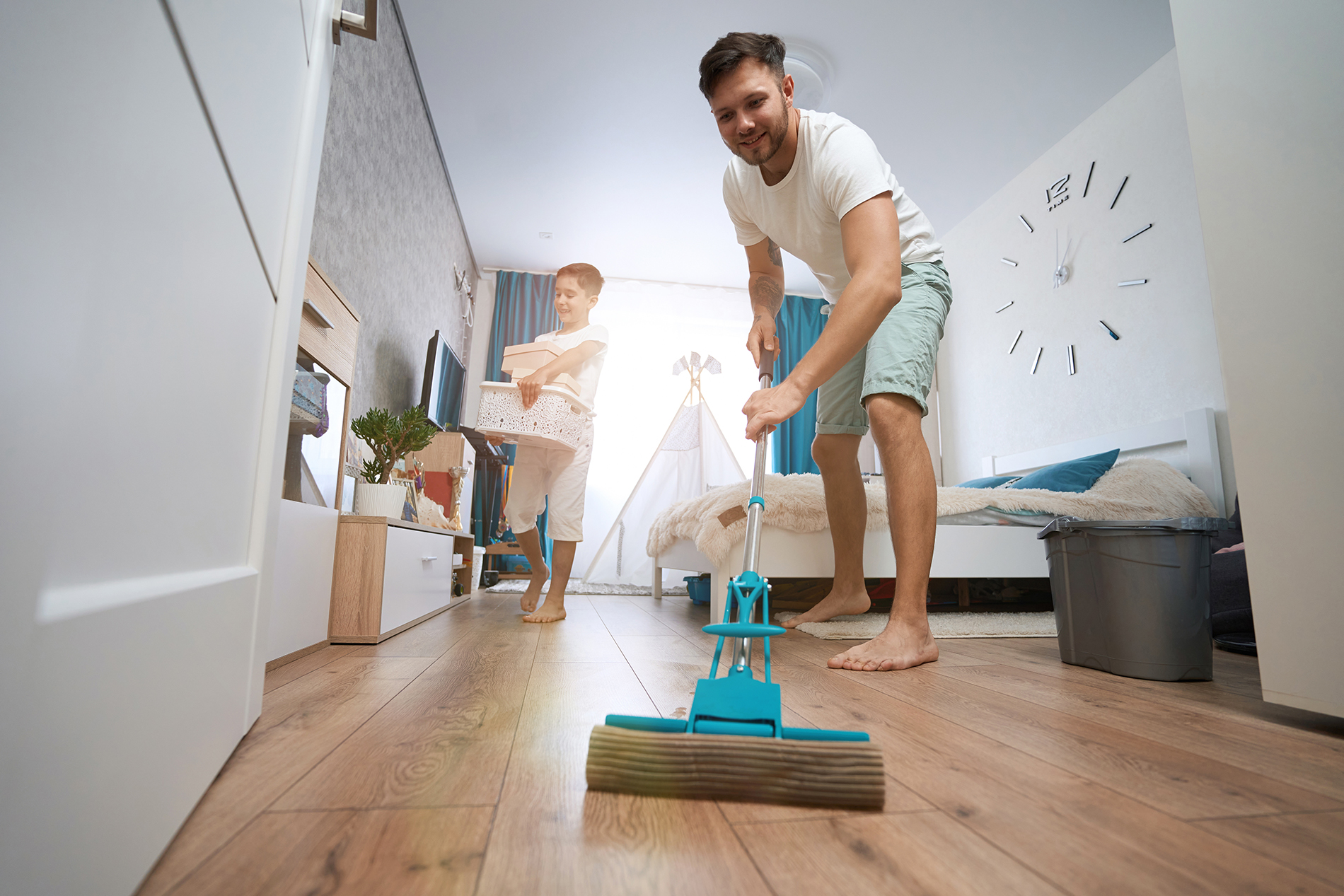 Family cleaning and decluttering their home